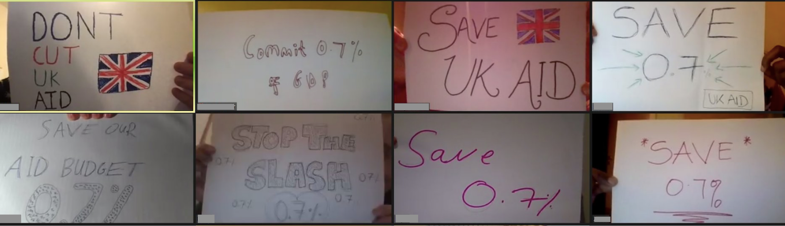 Zoom sccreenshot of 5 x 2 grid showing hand written 'Save UK aid/ 0.7%' signs being held up to the cameras