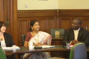 Mercy and Anthony address the meeting